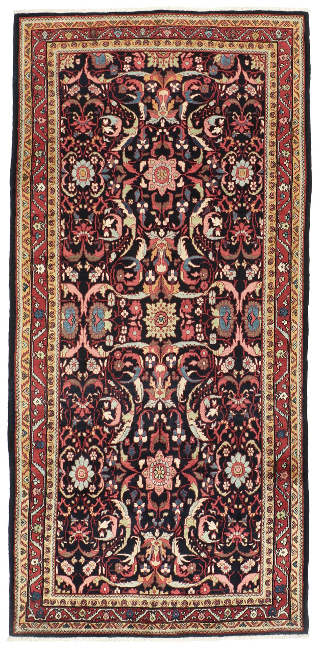 Handgeknoopt Jozan-tapijt uit het Midden-Oosten met een bloemmotief in zwart, rood en blauw.