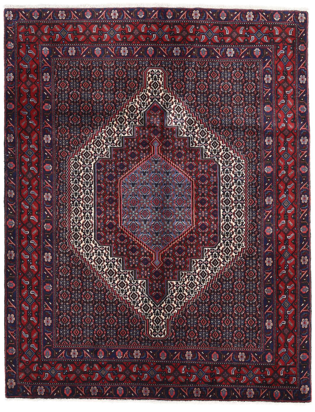 Hand-knotted Senneh rug from the Middle East in dark-red and blue tones