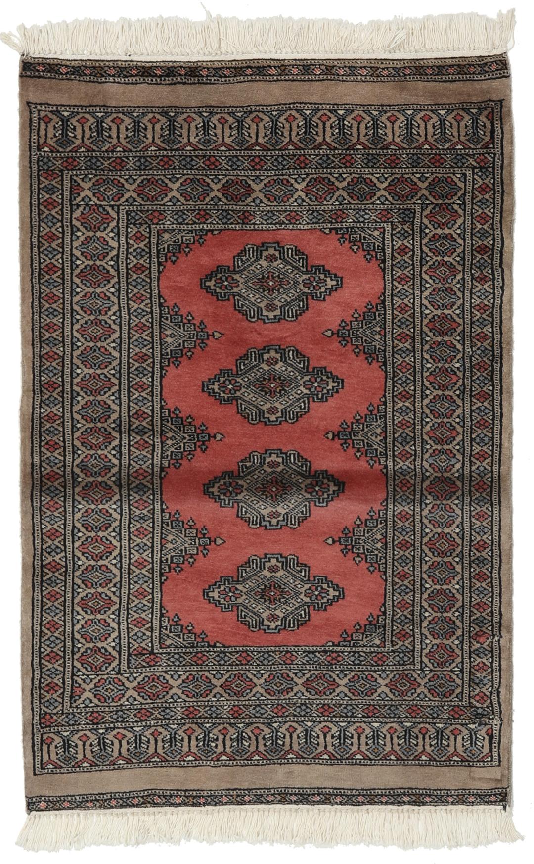Hand-knotted Pakistan Bokhara rug with a red and beige geometric pattern