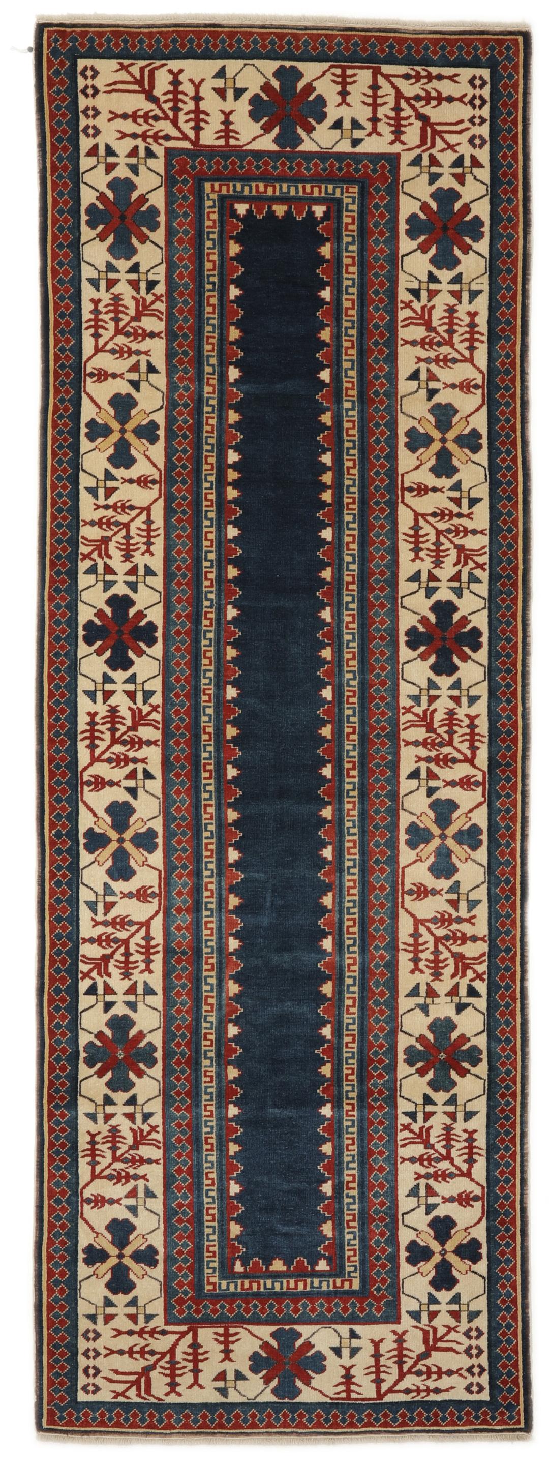 Handgeknoopte Turkse loper met diepblauwe en rode geometrische motieven