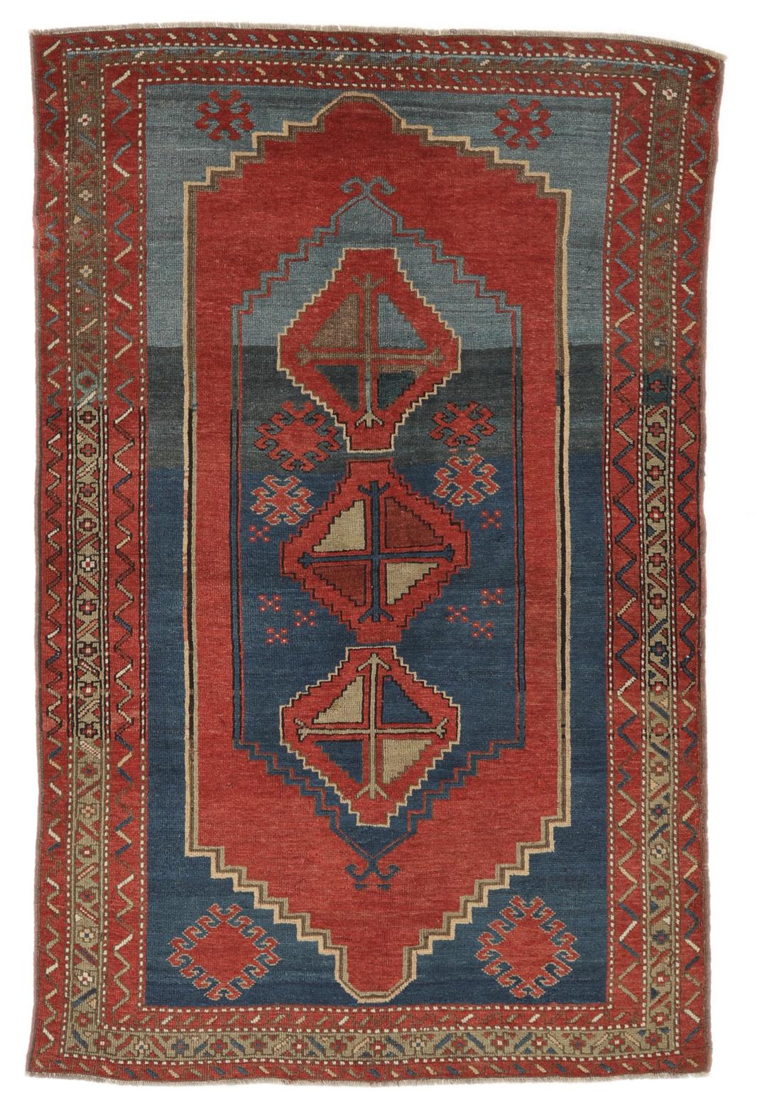 Antiek Lori Pambak tapijt uit Azerbeidzjan met een geometrisch medaillonontwerp in rood en blauw.