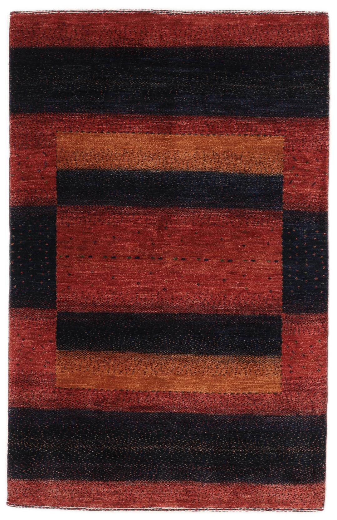 Hand-knotted Loribaft wool rug from the Middle East in red, orange, and blue.
