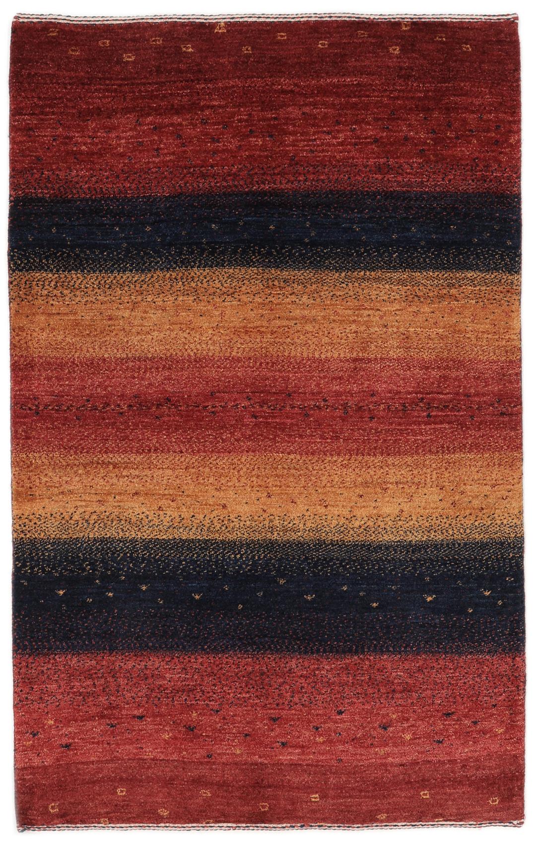 A hand-knotted Loribaft rug with earthy red, orange, and blue stripes from the Middle East
