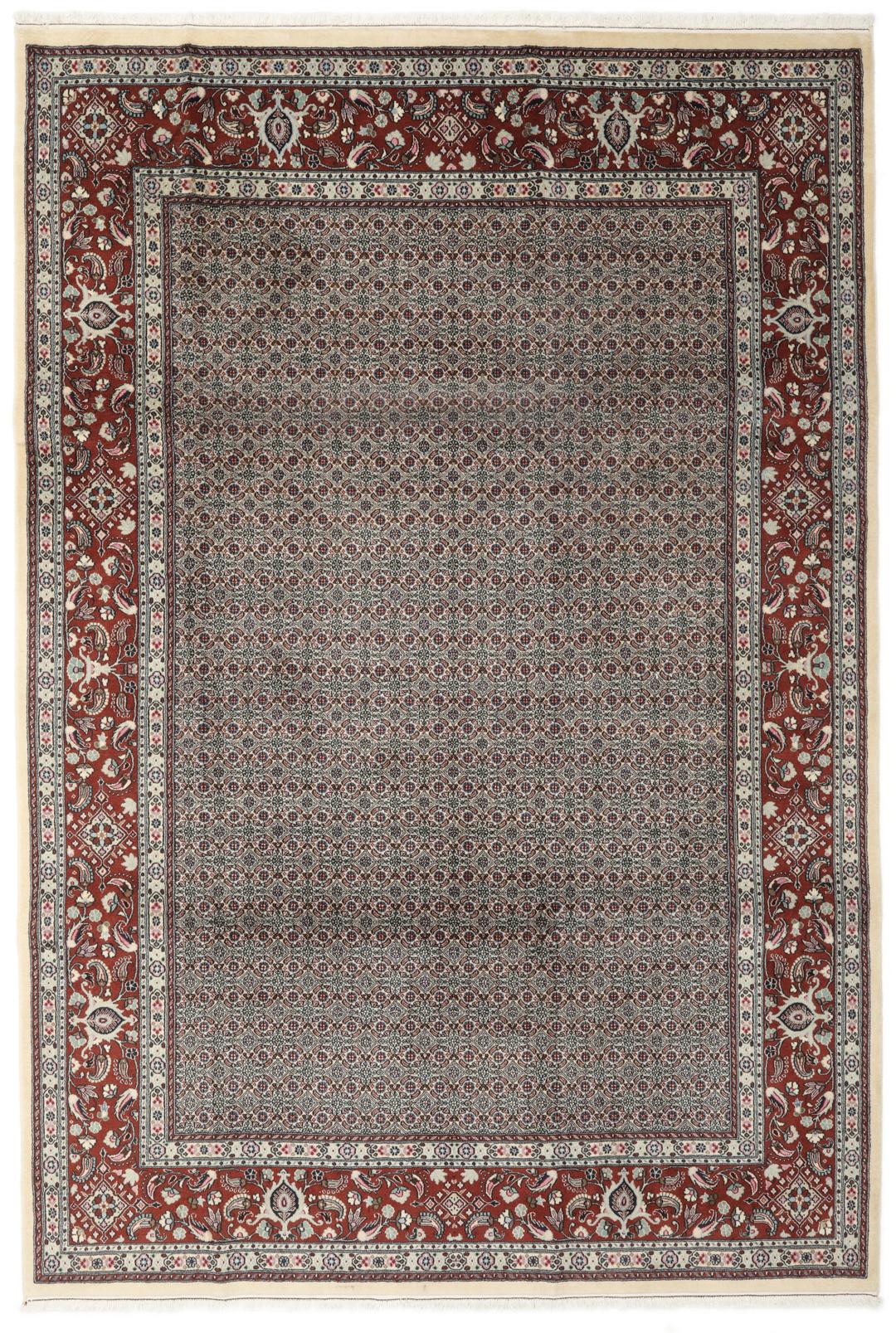 A hand-knotted Moud Wool rug from the Middle East in dark-red and beige tones.