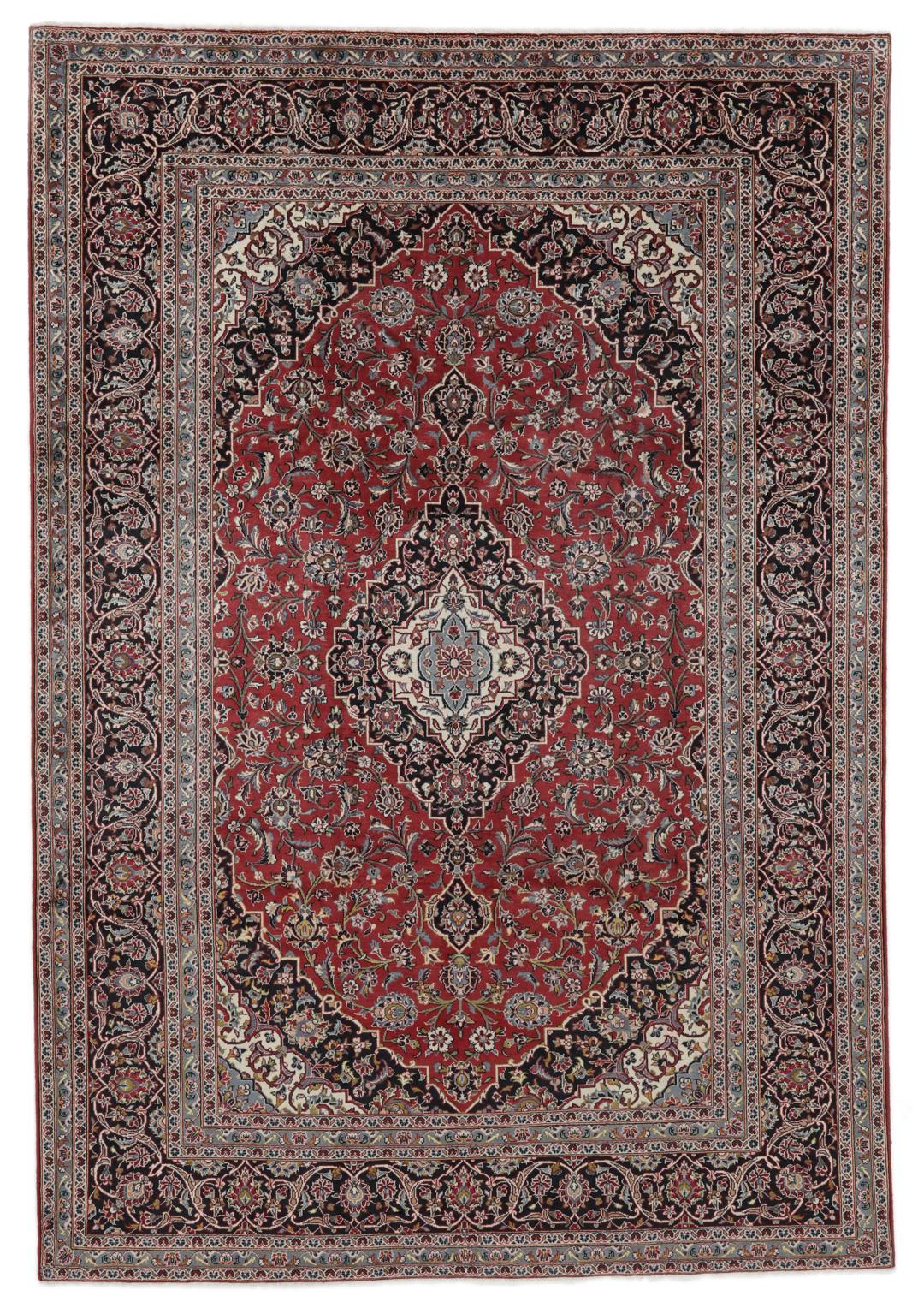 Hand-knotted Keshan rug from the Middle East in deep red and black