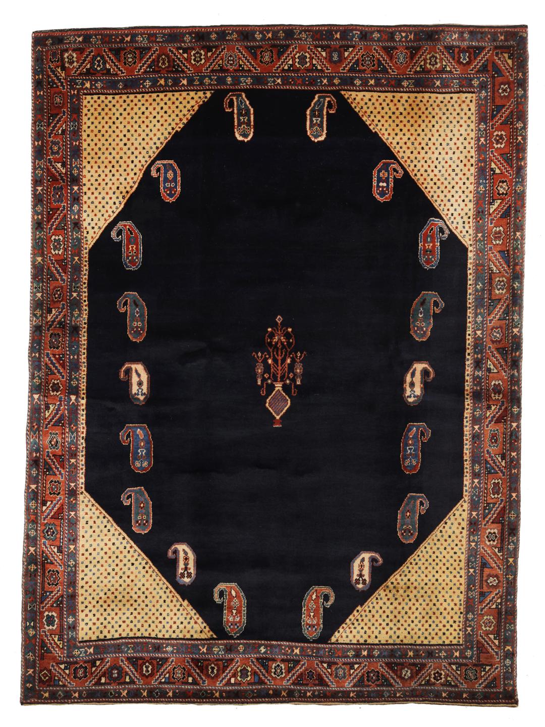 Een met de hand geknoopt Gabbeh Kashkooli tapijt met een diepblauw veld en een decoratieve rand uit het Midden-Oosten.