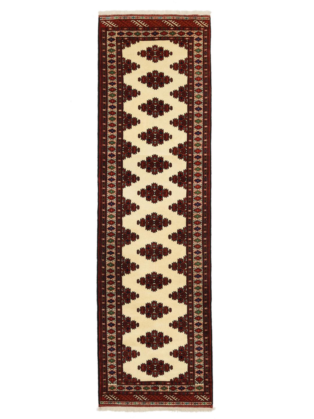 Handgeknoopte Turkaman loper uit het Midden-Oosten in beige en rode tinten.