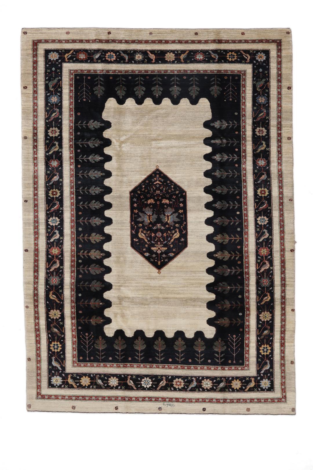 Handgeknoopt Gabbeh Kashkooli wollen vloerkleed met een zwart en beige bloemmotief uit het Midden-Oosten