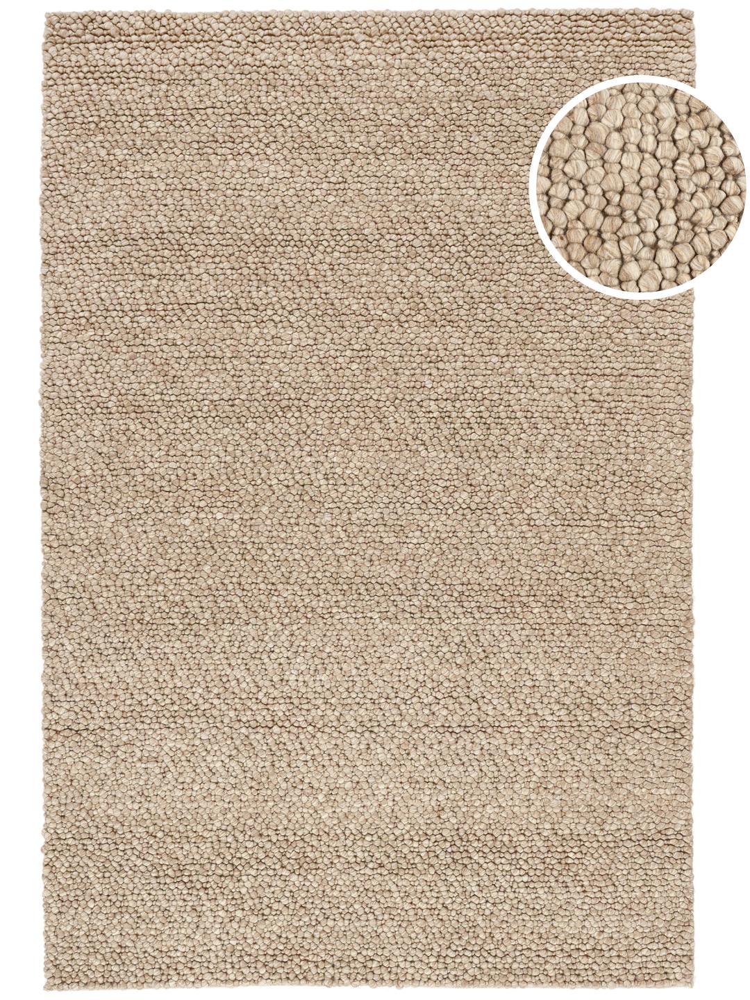 Beige tapijt met een getextureerd oppervlak van lussen