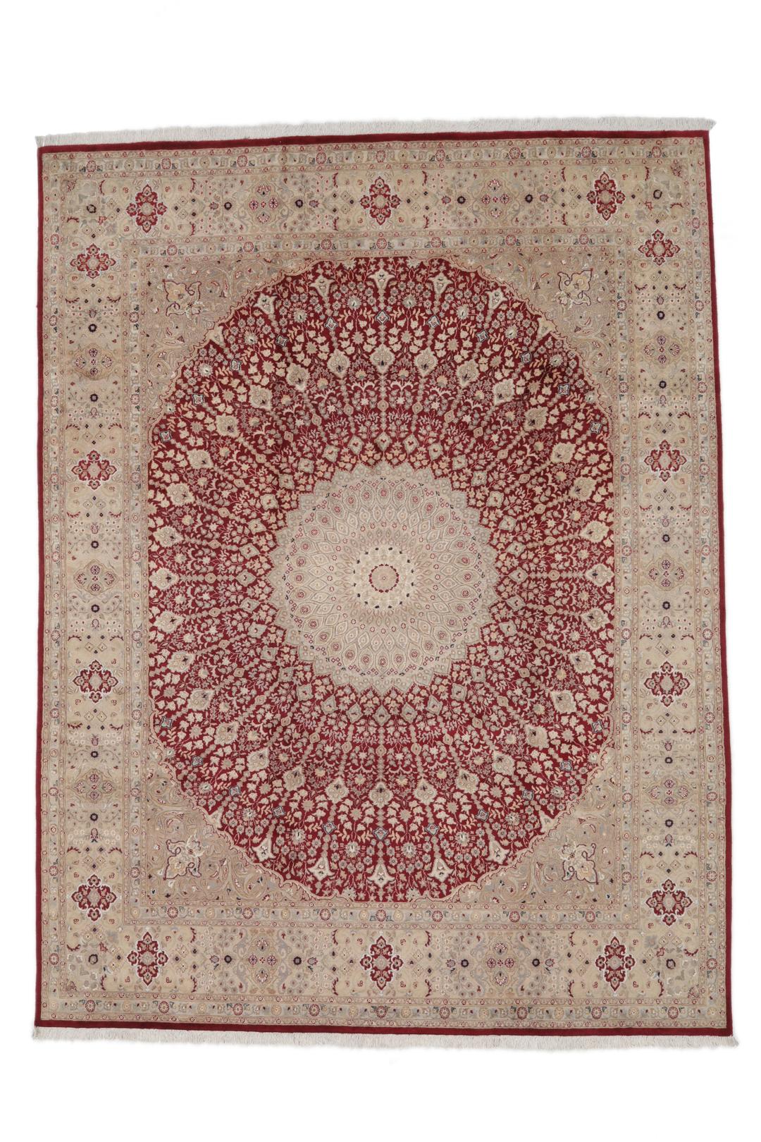 A hand-knotted Tabriz Royal rug from India featuring a central red medallion on a beige field.