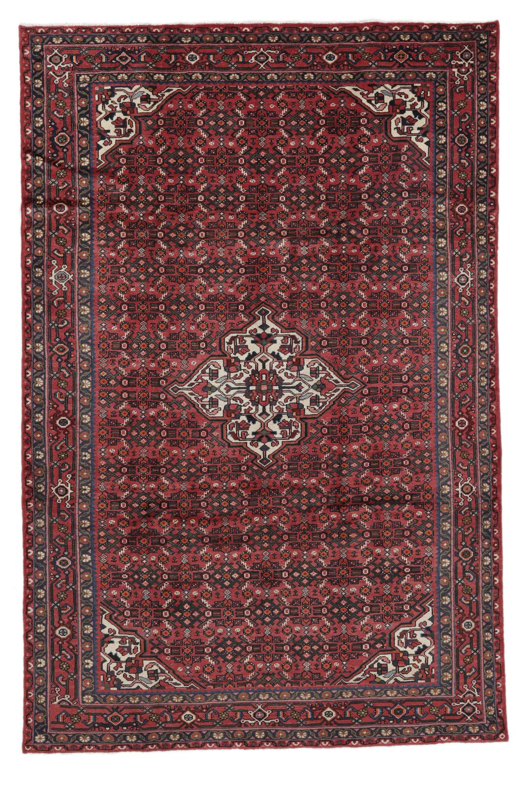 Hand-knotted Hosseinabad rug with red and dark-blue tones from the Middle East.
