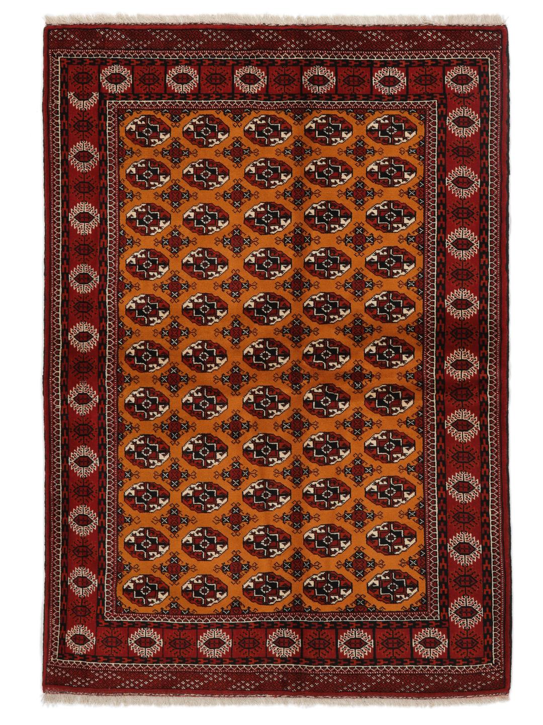 Hand-knotted Turkaman rug from the Middle East featuring an amber field and dark red border.