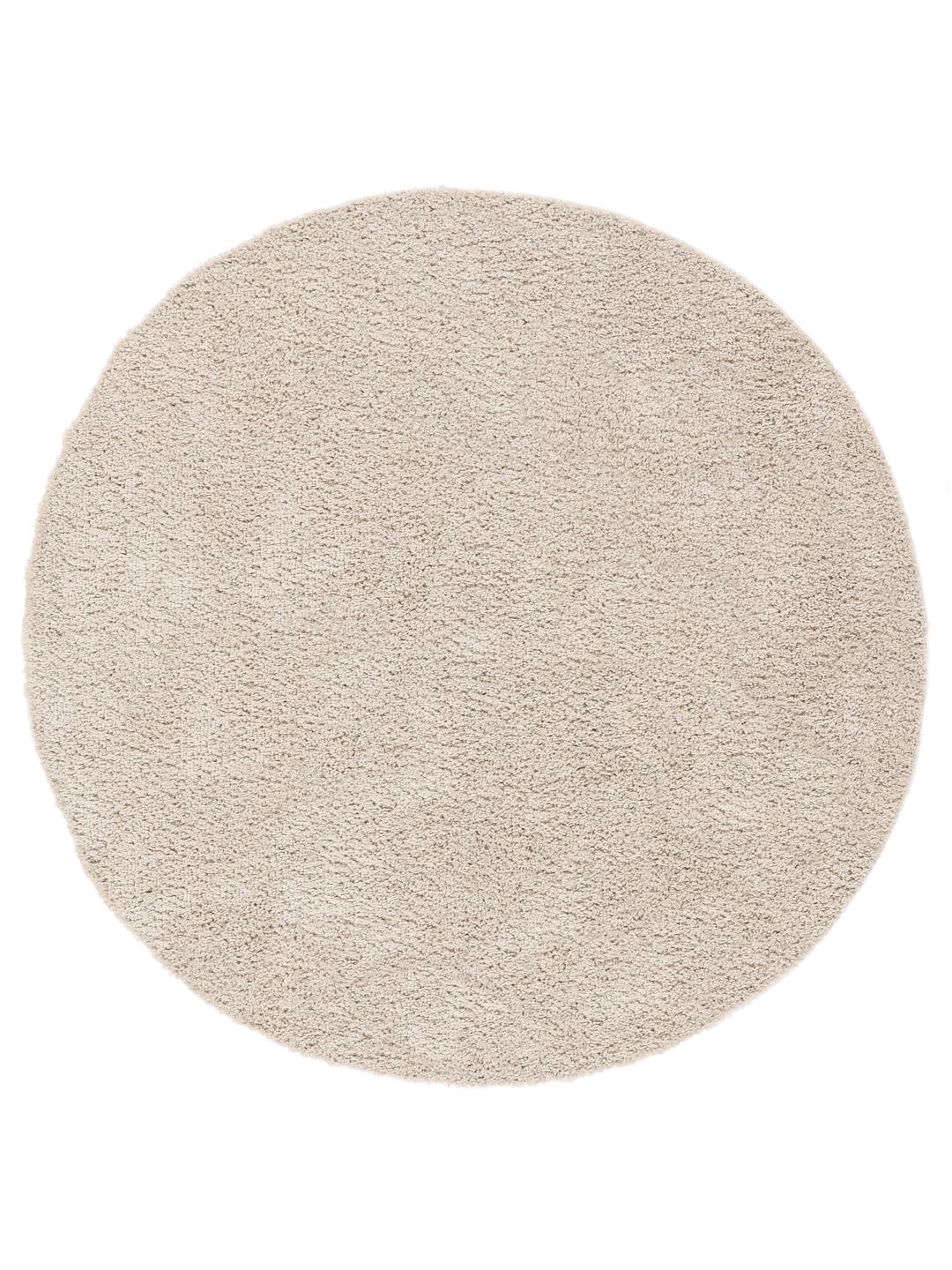 Rundt beige tæppe