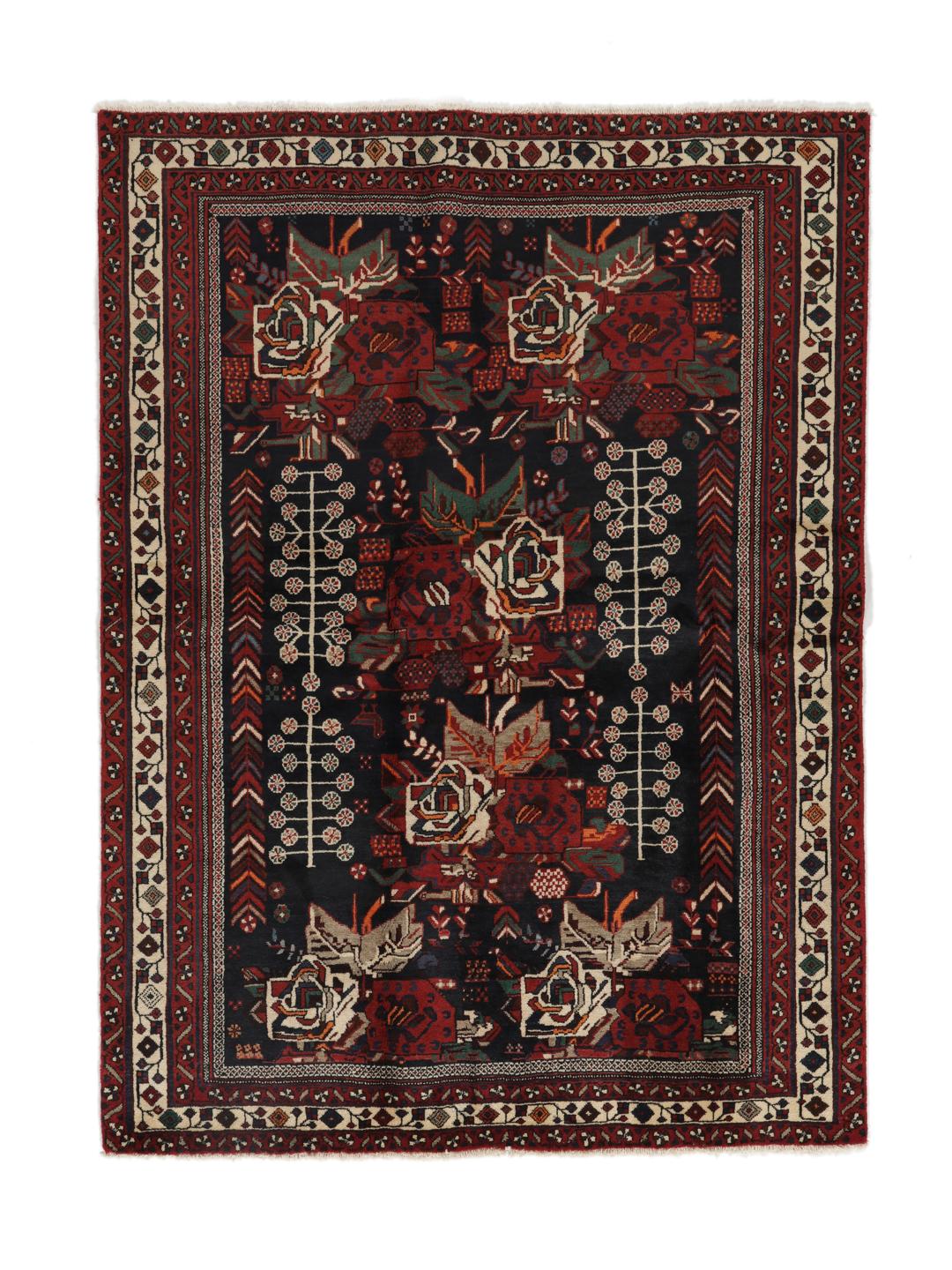 Hand-knotted Afshar wool rug from the Middle East featuring a dark-red and black floral design.