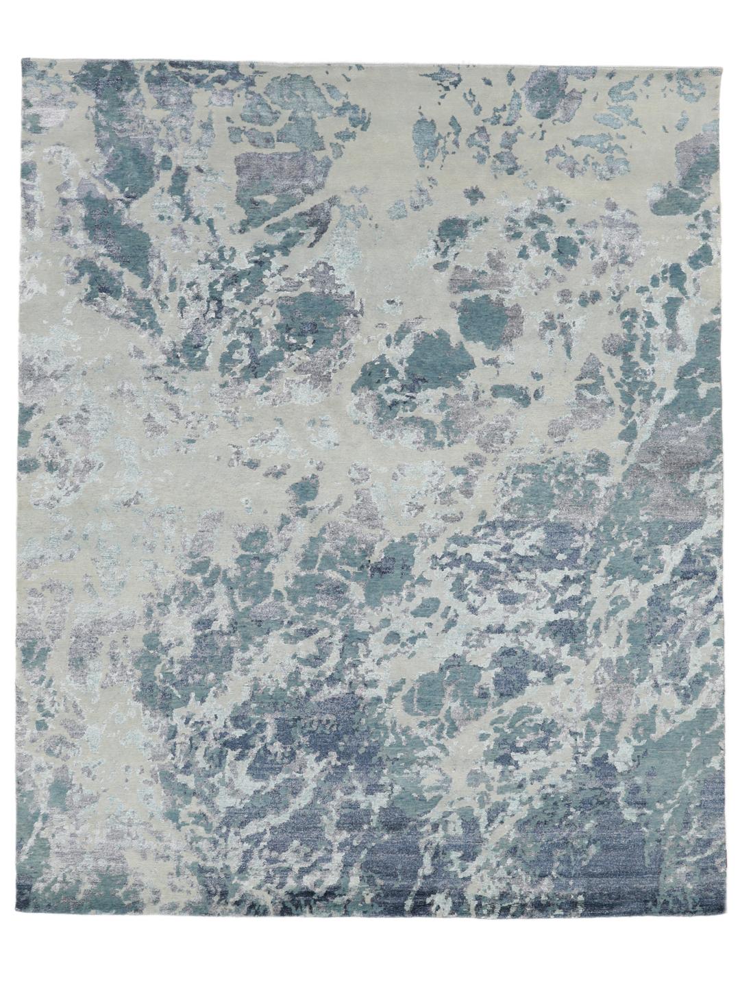 Et moderne håndknyttet tæppe fra Indien med et abstrakt blåt og beige mønster.