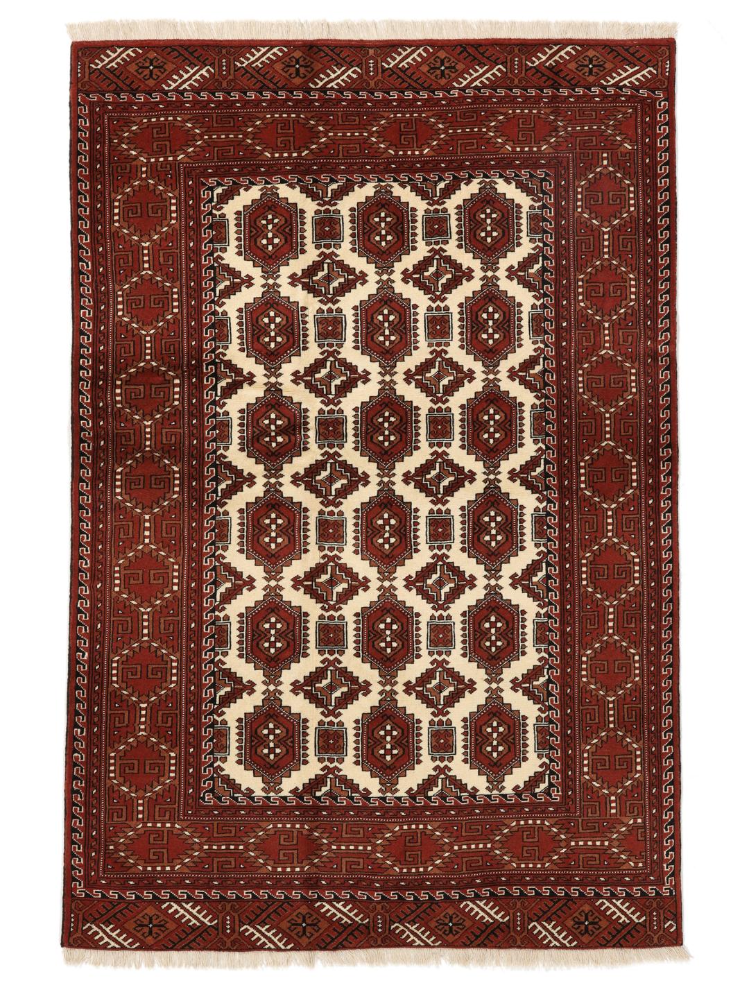 Hand-knotted Turkaman rug from the Middle East in red and cream tones
