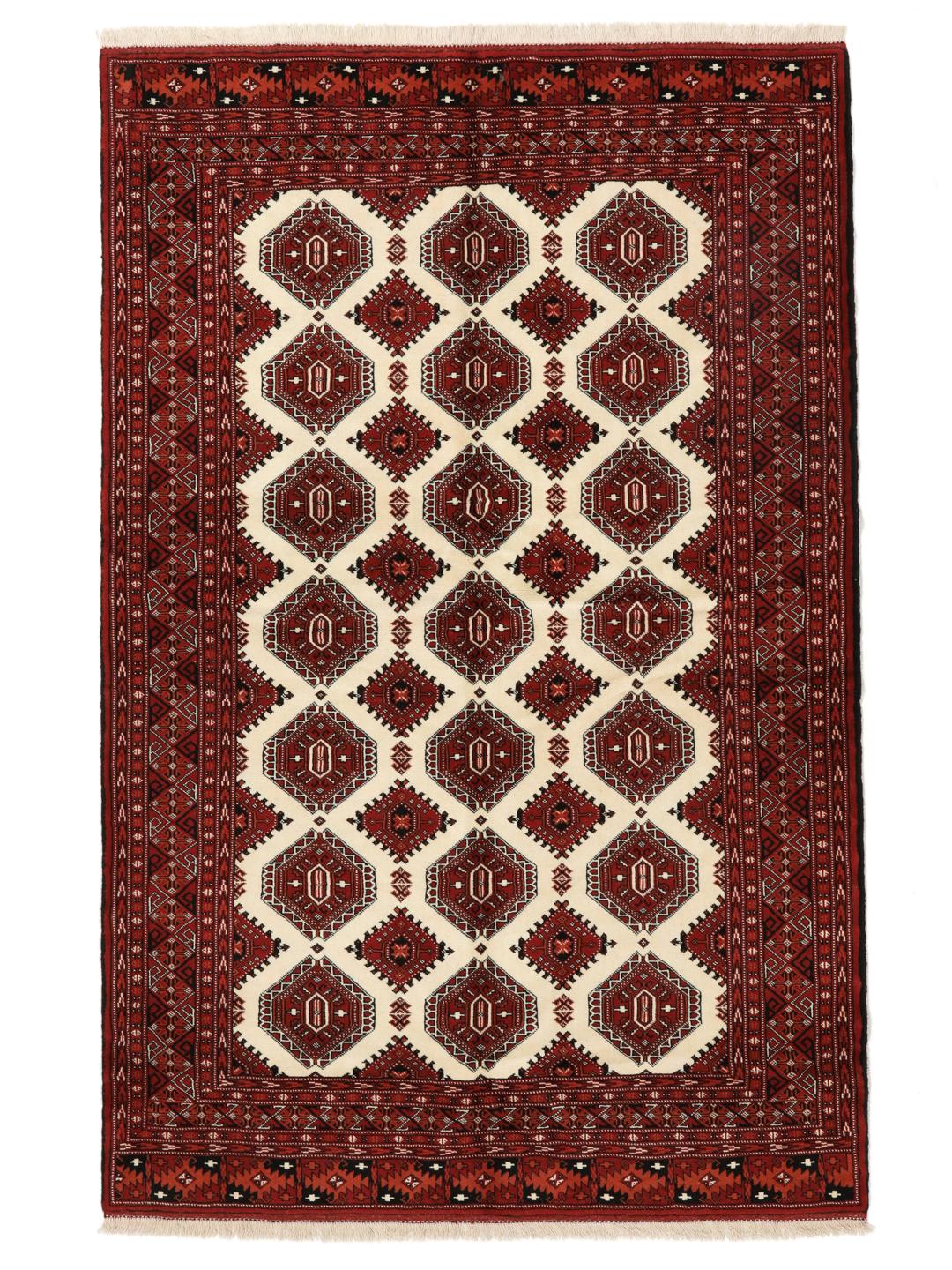 Hand-knotted Turkaman rug from the Middle East in shades of red and beige