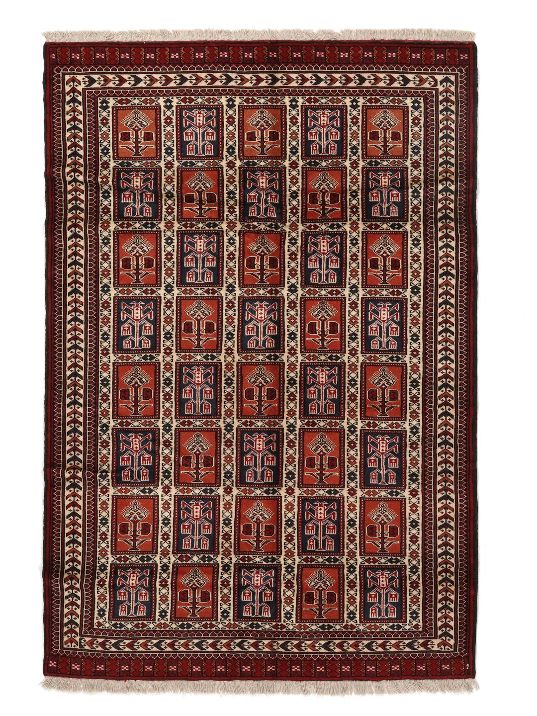 Hand-knotted Turkaman rug from the Middle East in red tones.