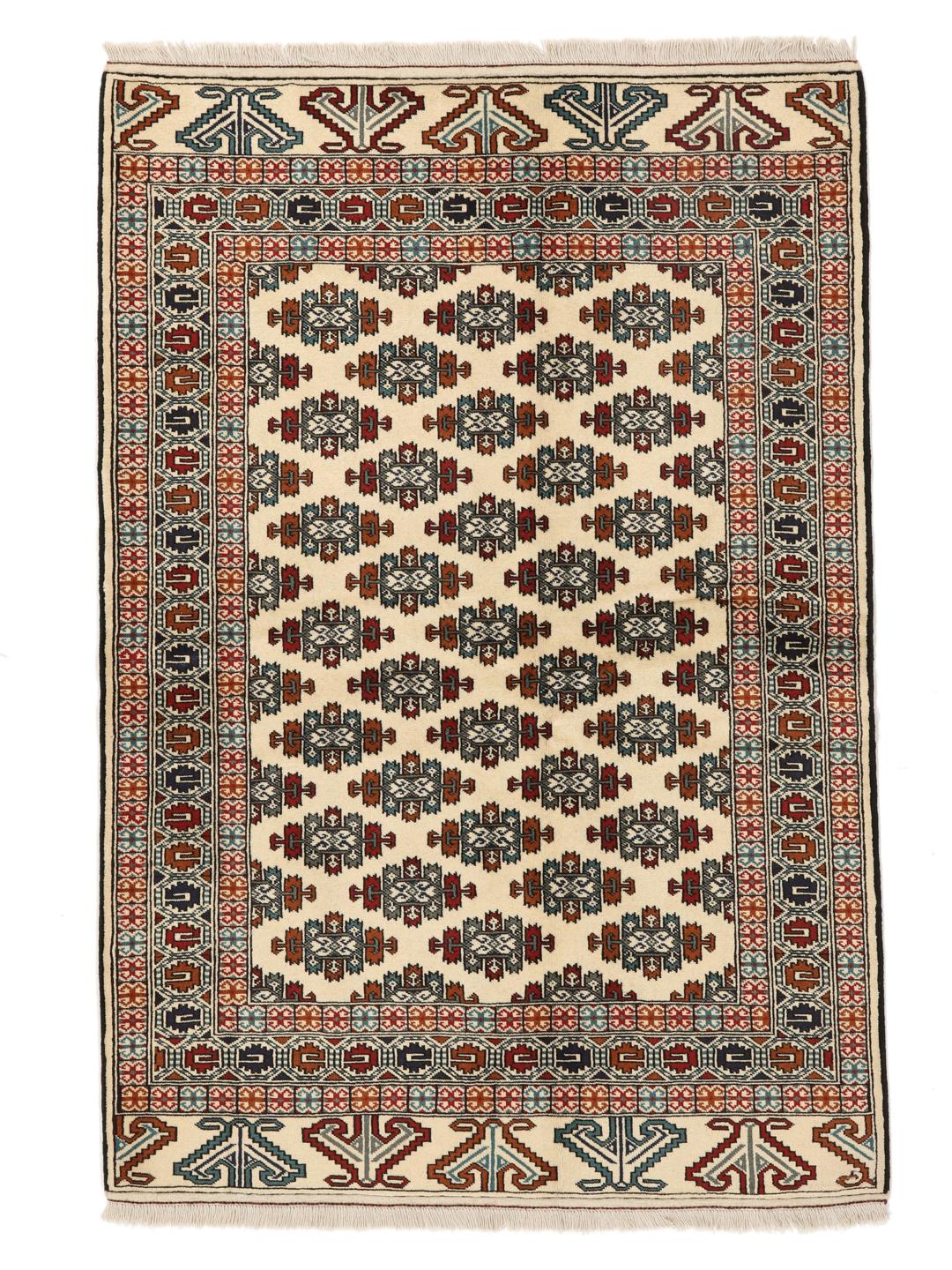 Hand-knotted Turkaman rug from the Middle East in beige