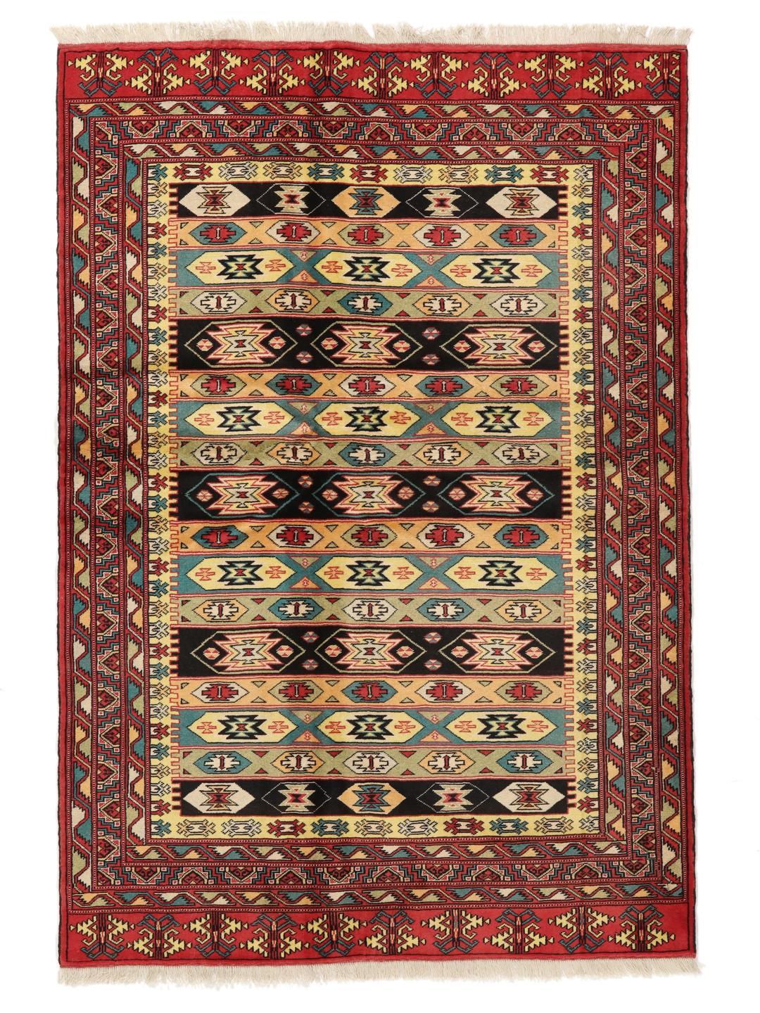 Hand-knotted Turkaman rug from the Middle East in vibrant red and geometric patterns