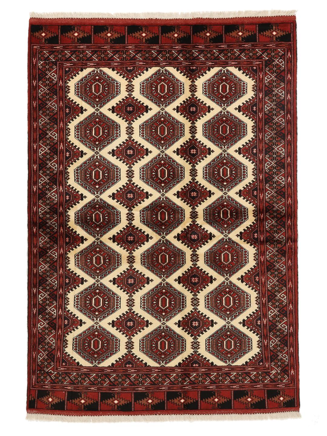 Hand-knotted Turkaman rug from the Middle East in deep red and beige tones.