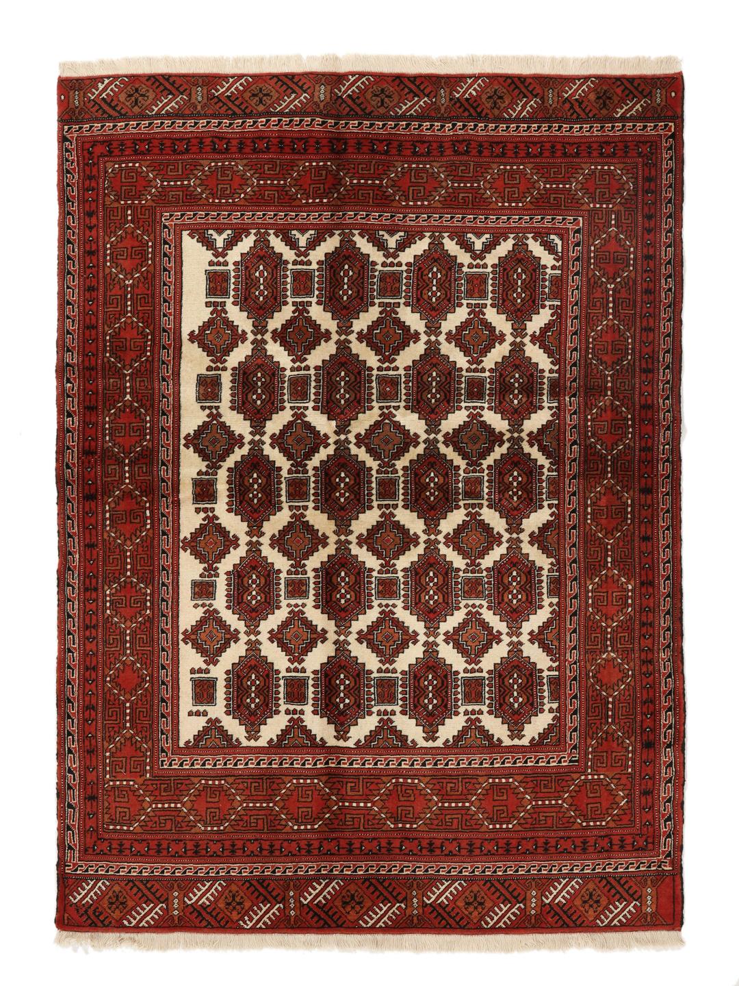 Hand-knotted Turkaman rug from the Middle East in red and beige tones.