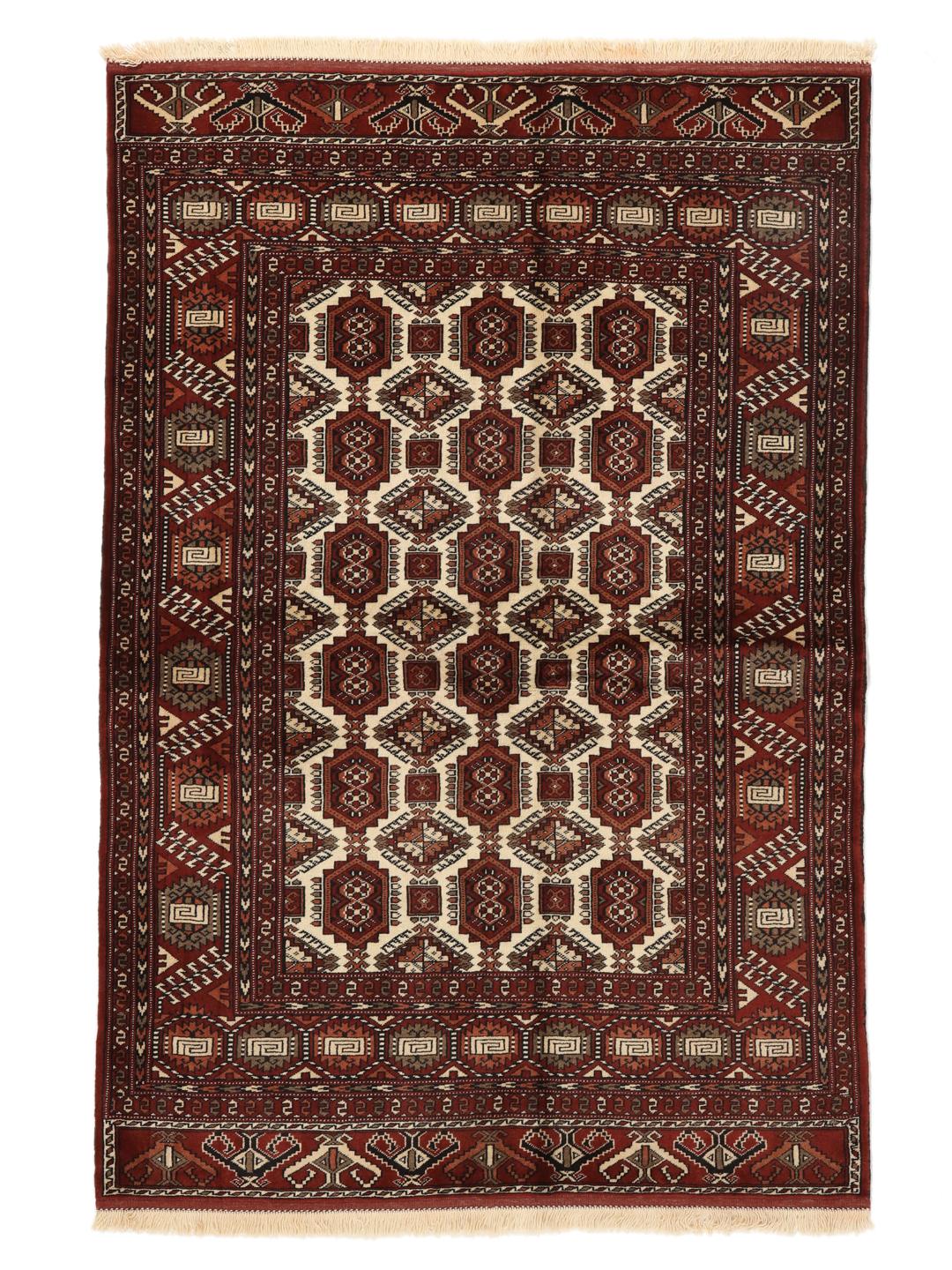 Hand-knotted Turkaman rug from the Middle East in red