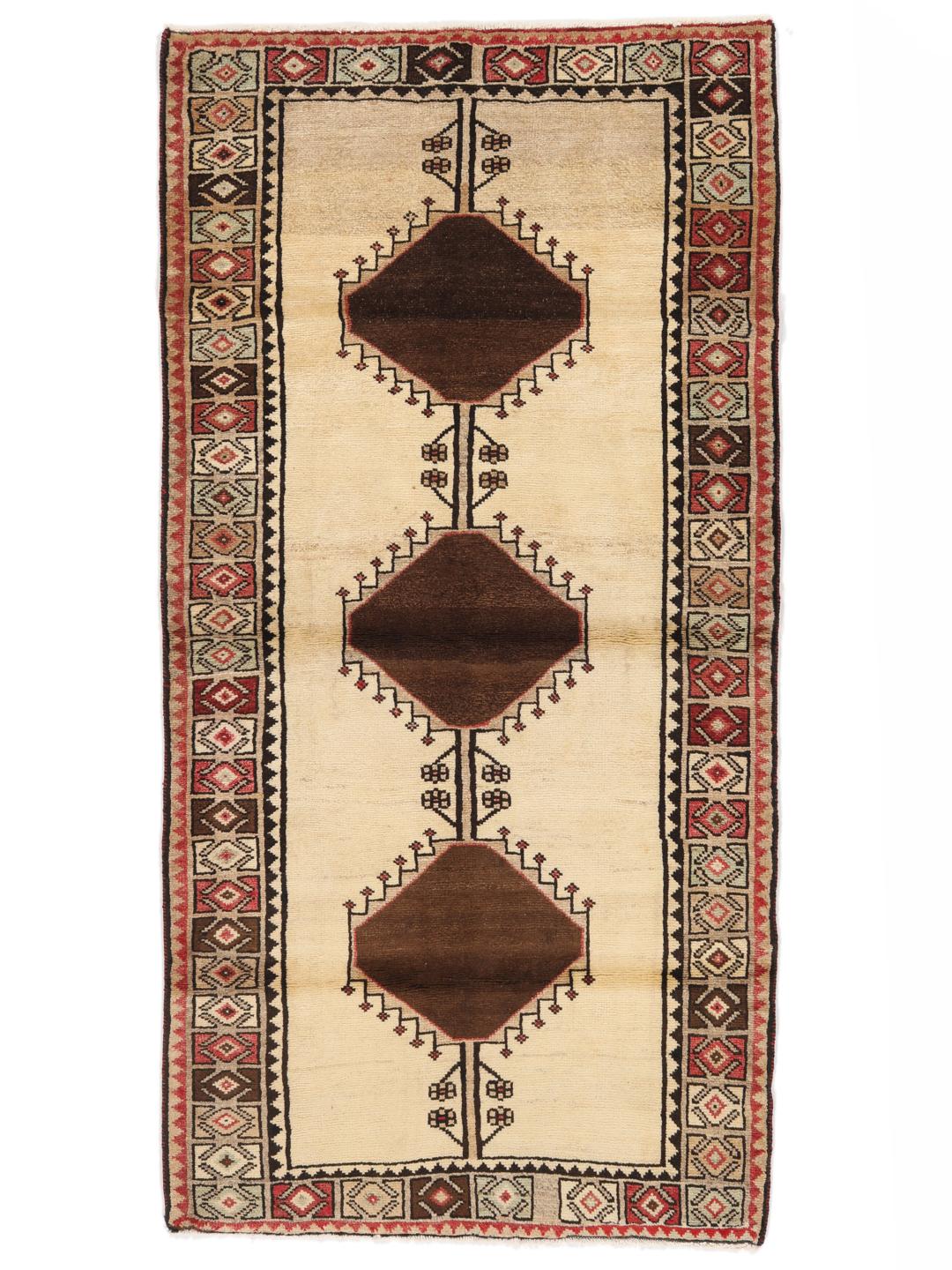 Håndknyttet Lori-tæppe fra Mellemøsten med beige bund og geometriske motiver.