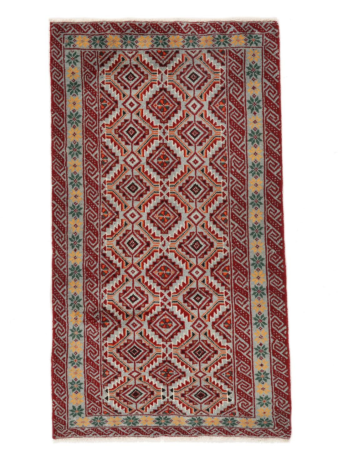 Hand-knotted Baluch rug with geometric patterns in red and grey from the Middle East