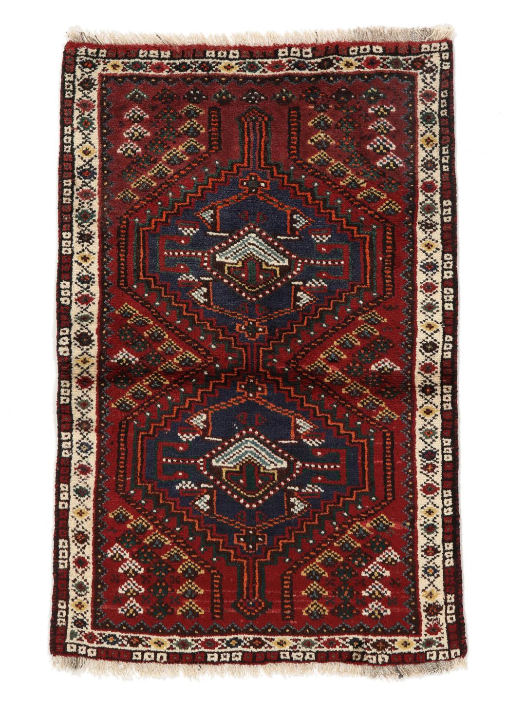 Hand-knotted Shiraz rug from the Middle East in deep red and blue tones