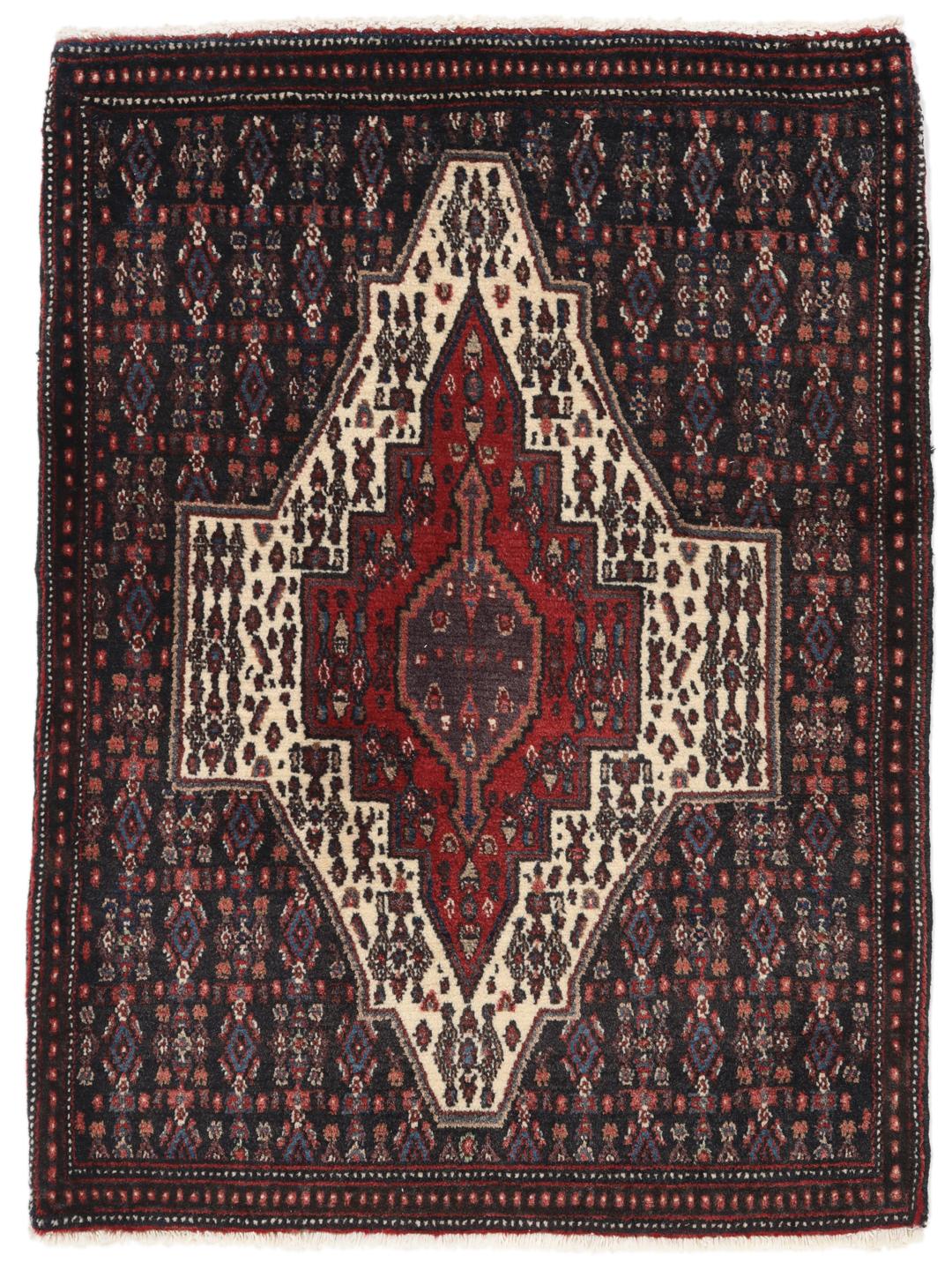 Hand-knotted Senneh rug from the Middle East in dark-blue and dark-red tones.