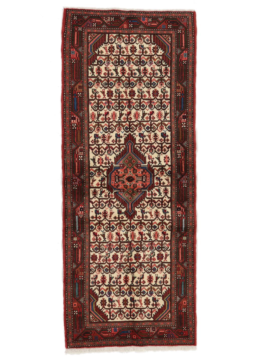 Handgeknoopte loper uit het Midden-Oosten met een rood en beige geometrisch patroon