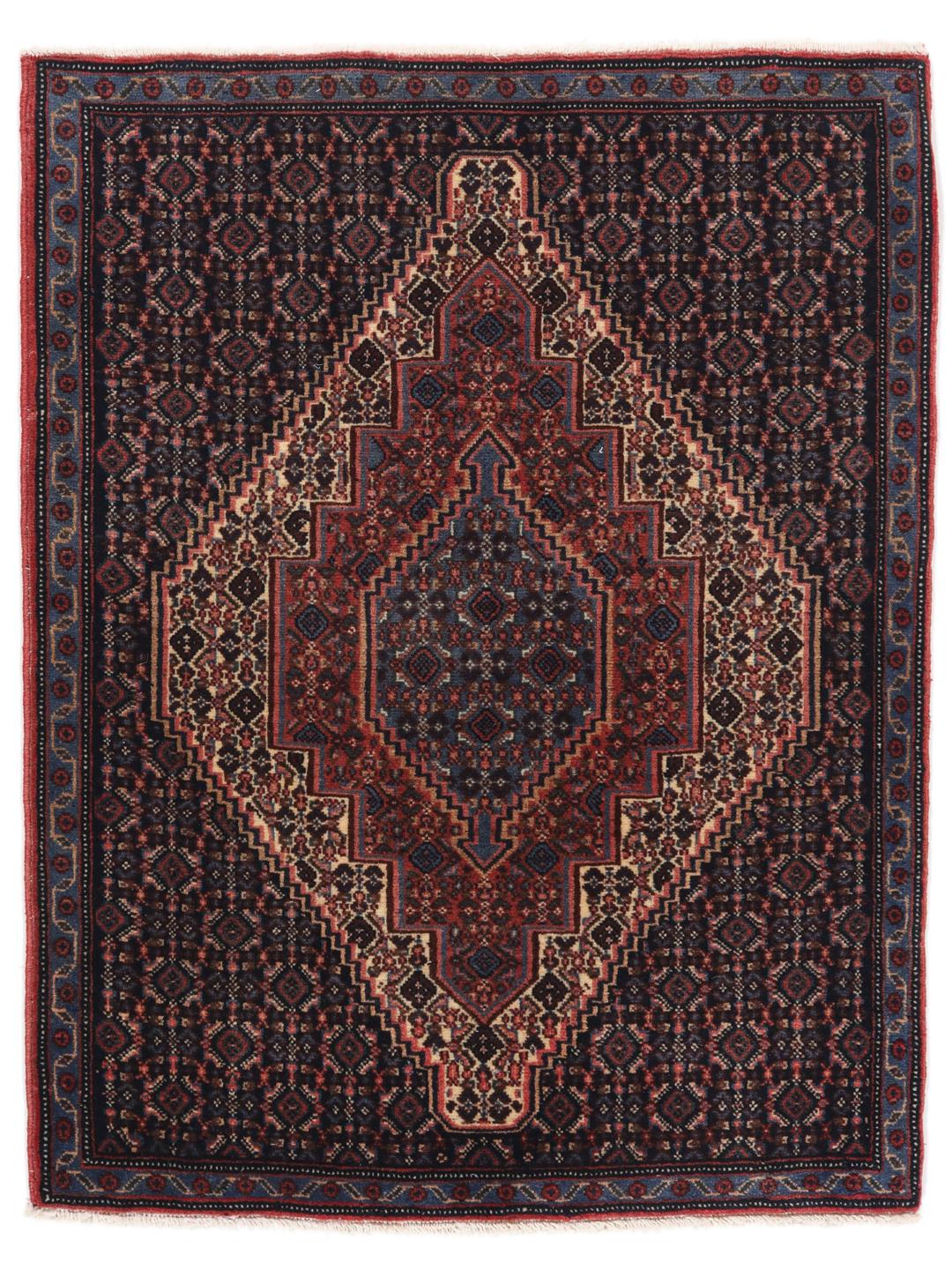 A hand-knotted Senneh rug from the Middle East in dark-blue and dark-red tones.