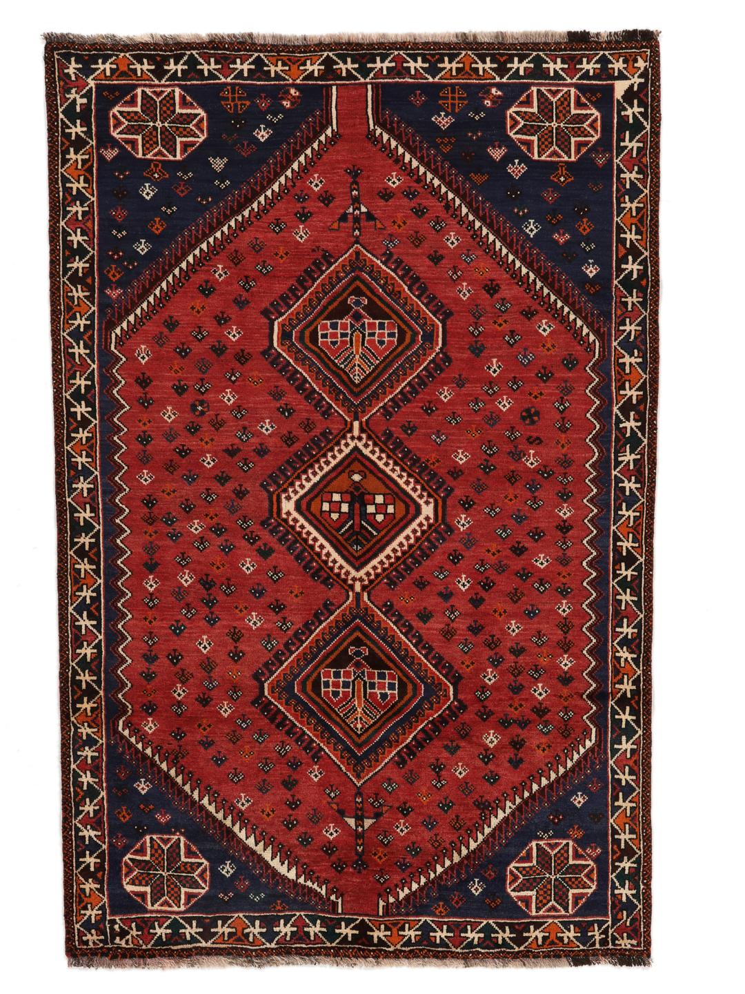 Hand-knotted Shiraz rug from the Middle East in red and navy blue