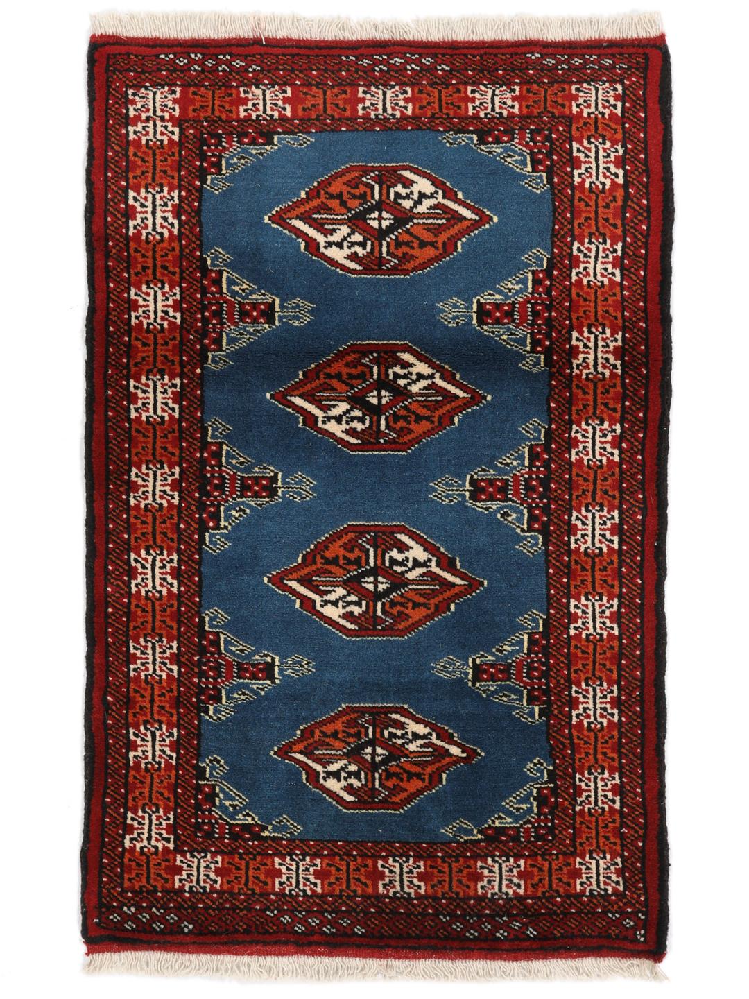 Hand knotted blue Turkaman rug from the Middle East