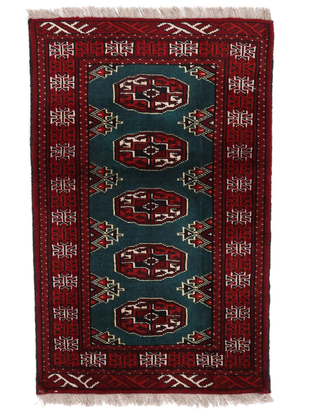 Hand-knotted Turkaman rug from the Middle East in dark-red and dark-teal