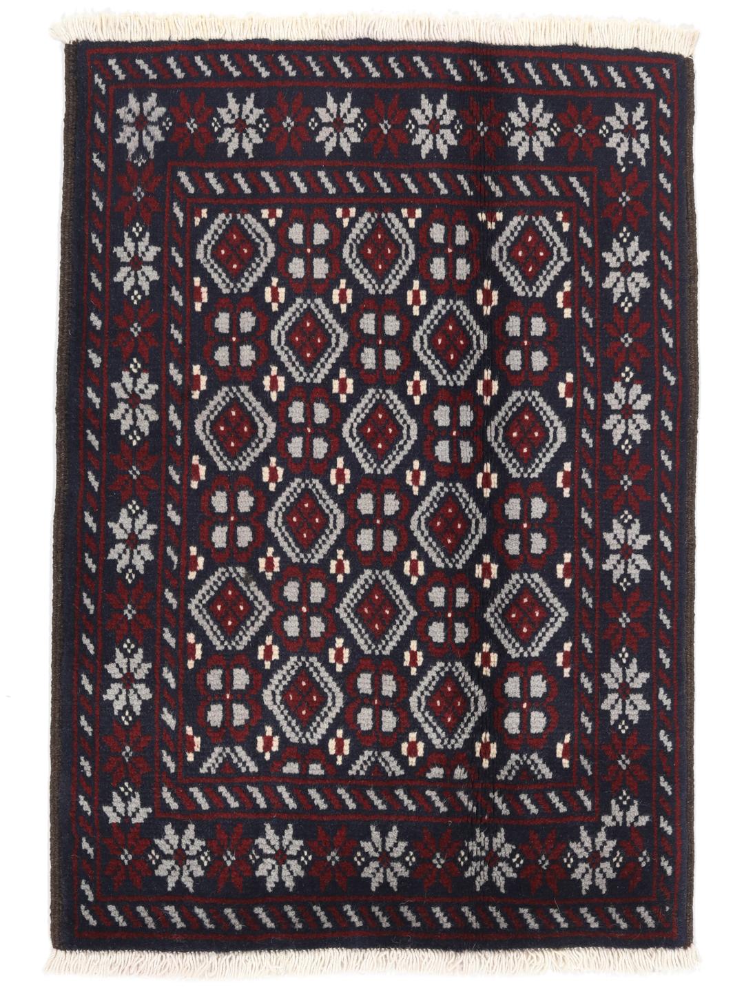 Hand-knotted Baluch rug with geometric tribal patterns in dark blue and red