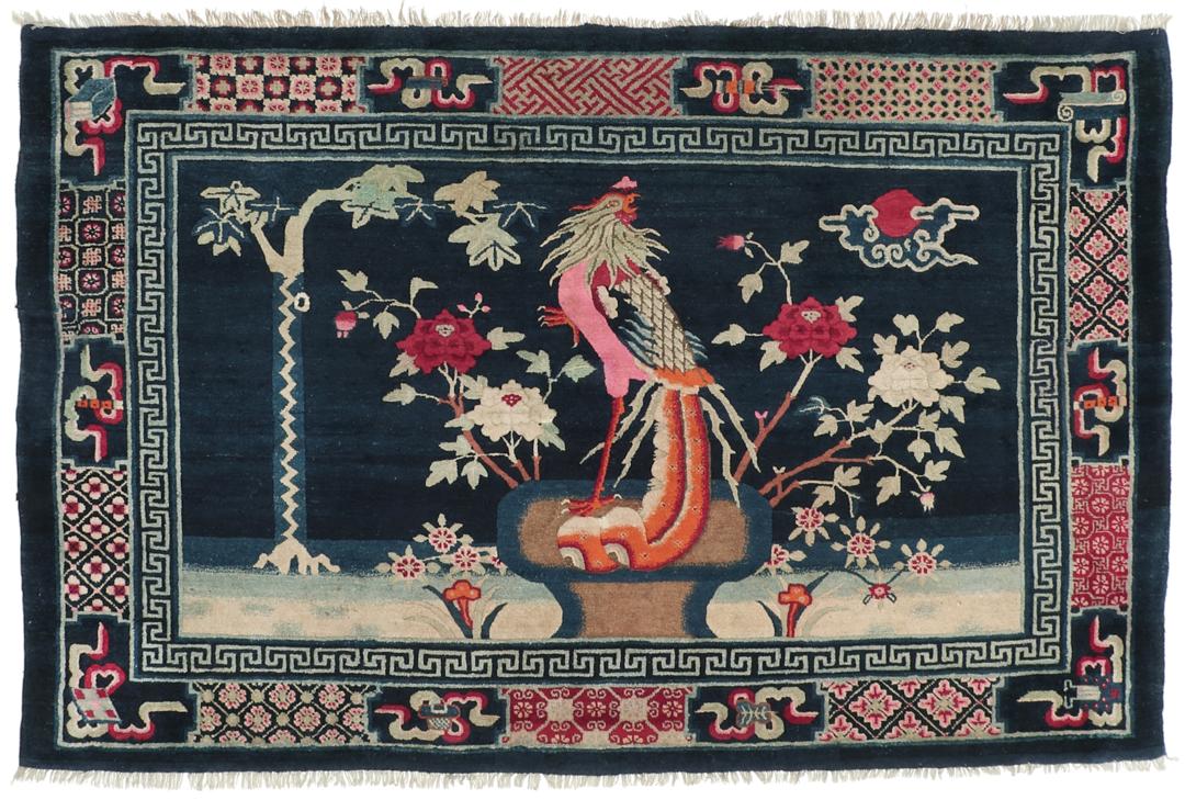 Antique Chinese Art Deco rug featuring a phoenix motif in dark-blue and pink