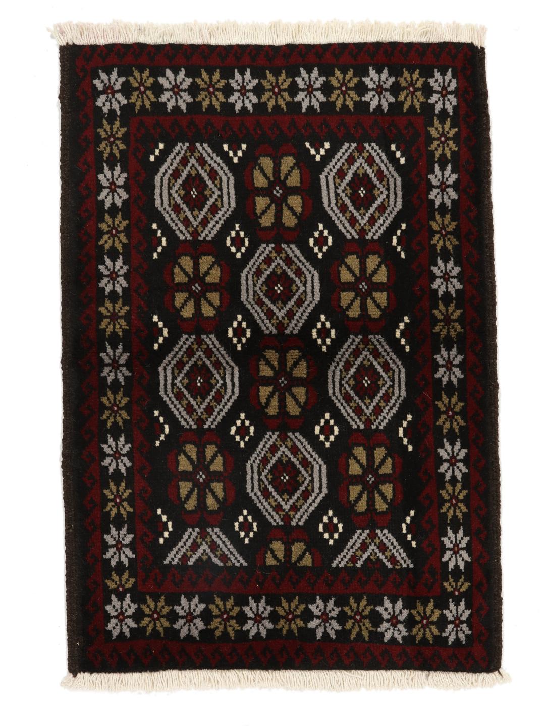 Handmade Middle Eastern Beluch rug with tribal motifs in multicolor