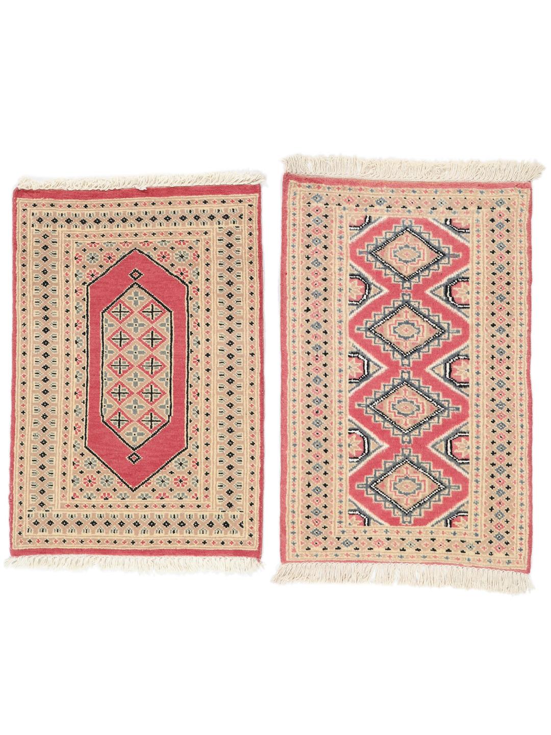 A set of two hand-knotted Pakistan Bokhara Wool rugs in red and beige tones.