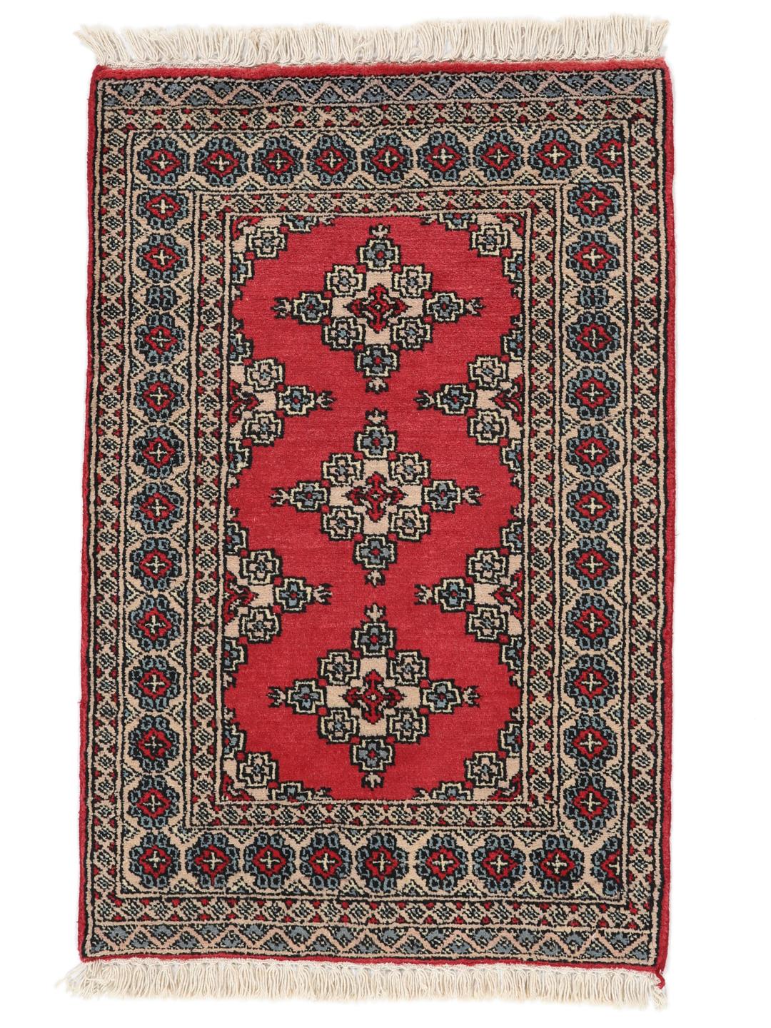 Hand-knotted Pakistan Bokhara rug in red with geometric motifs