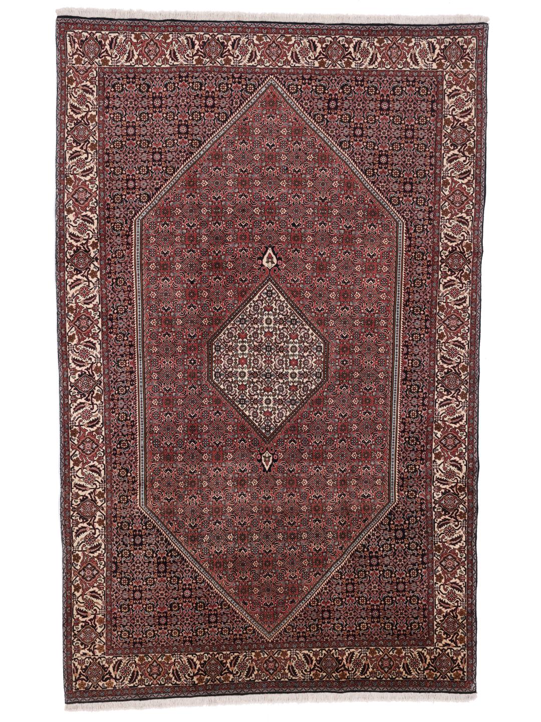 A hand-knotted Bidjar rug from the Middle East in deep red tones.