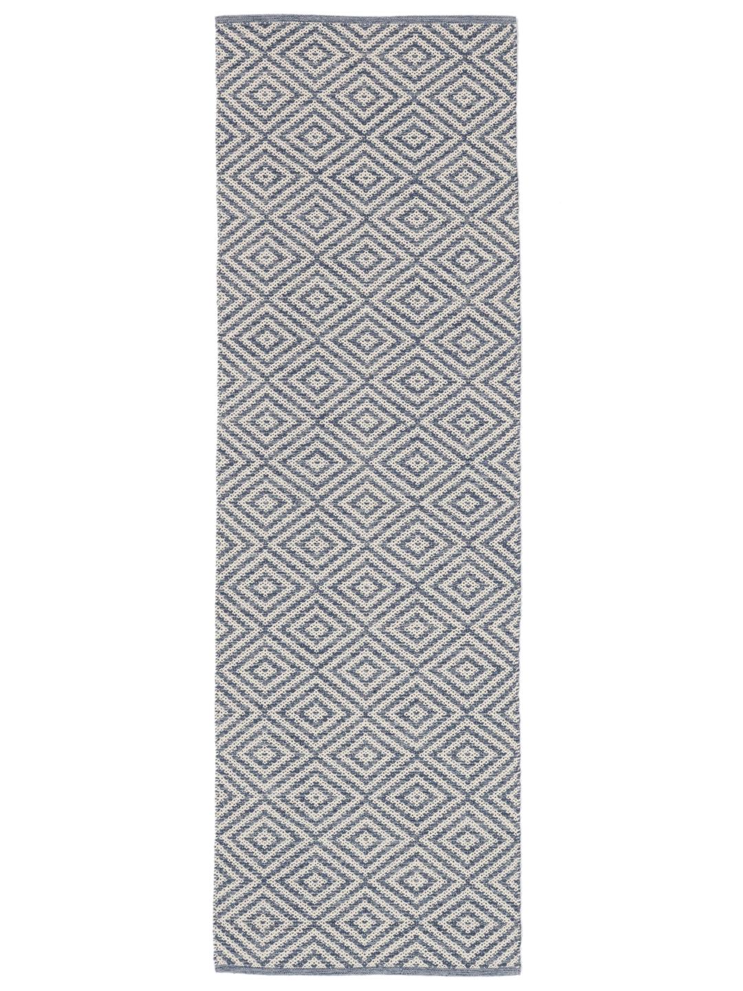 Handgeweven blauw en witte katoenen loper met een geometrisch patroon