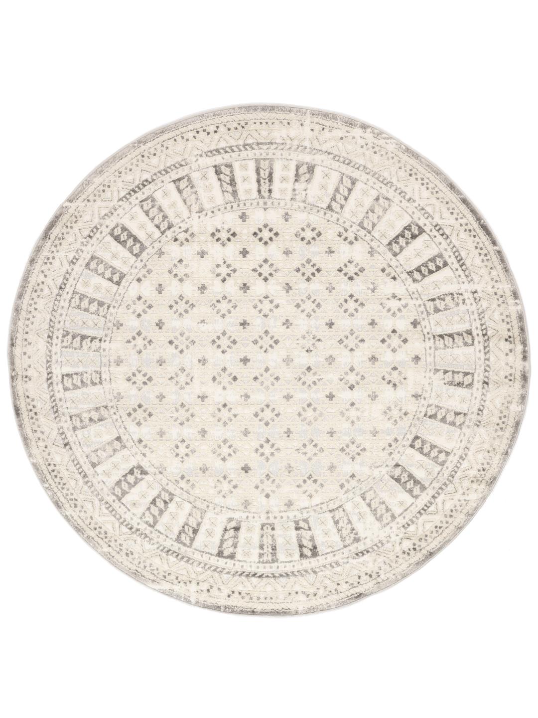 rond beige vloerkleed met gedessineerde rand