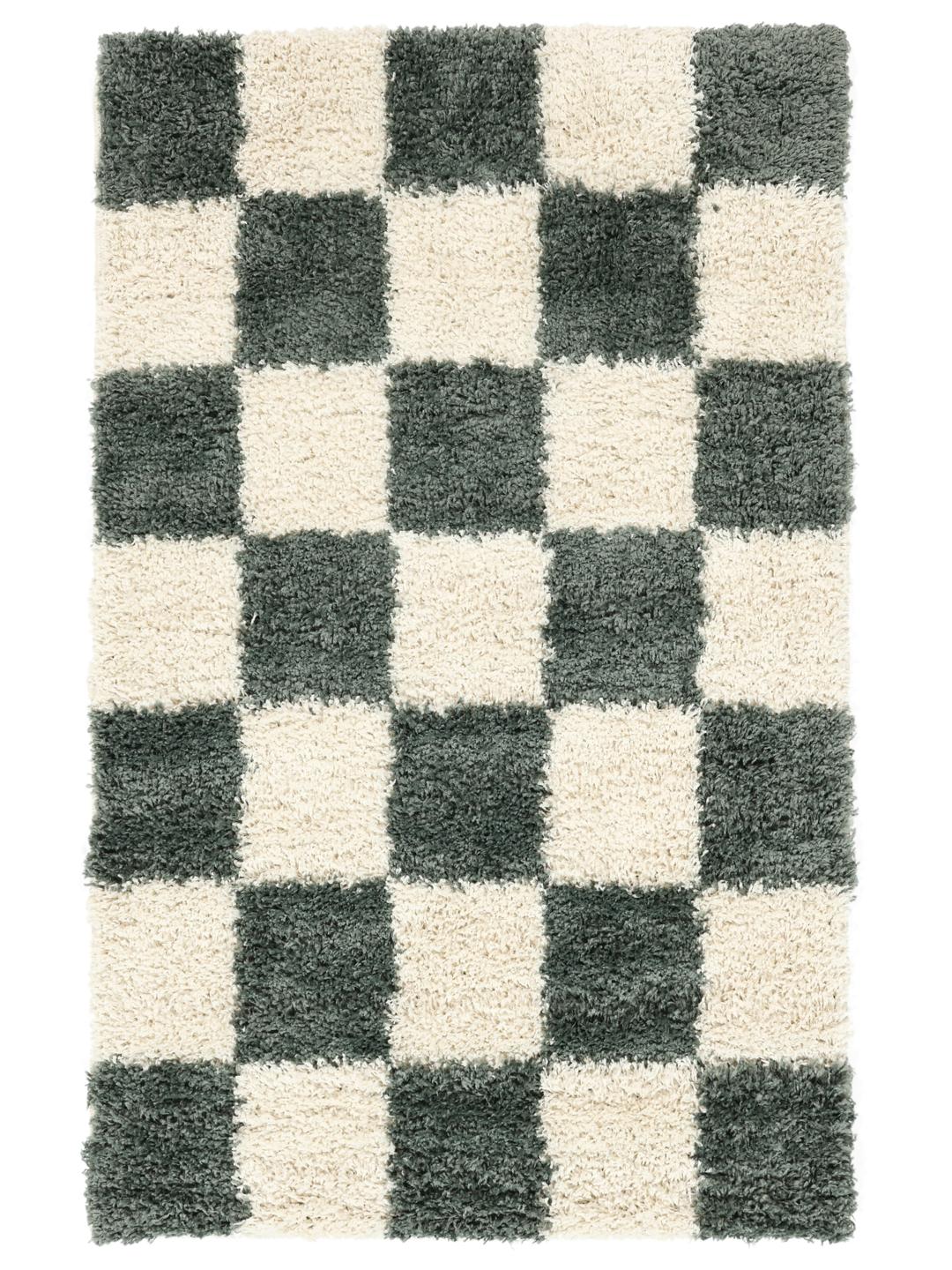 Groen vloerkleed met een pluche pooltextuur