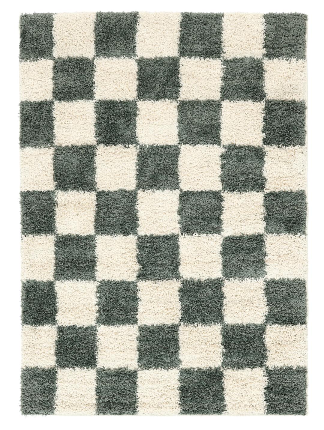 Groen vloerkleed met een pluche pooltextuur