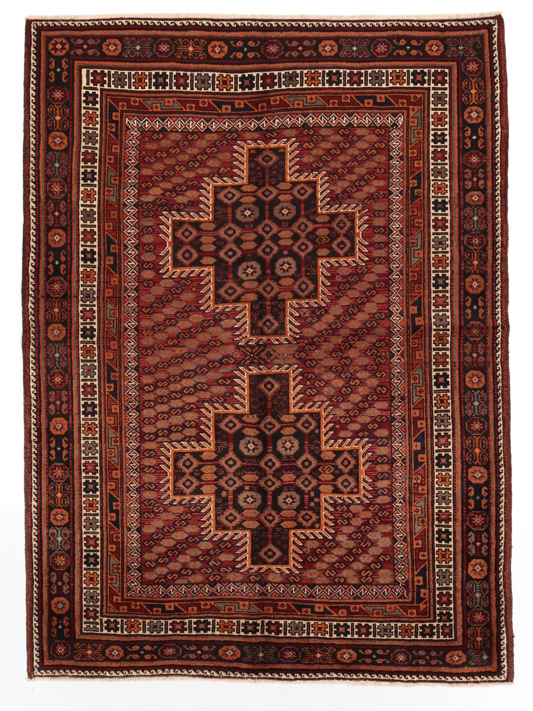 Hand-knotted Afshar rug from the Middle East with a red and dark-red geometric design