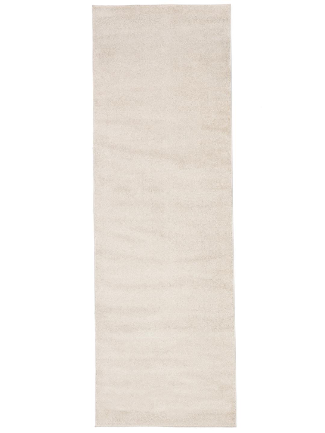 Un tapis de couloir doux blanc crème au design épuré et minimaliste.