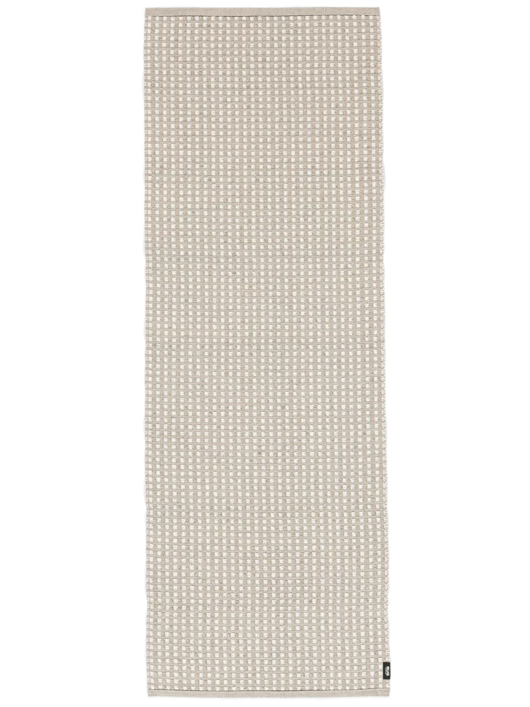 Beige løber med en diskret vævet struktur
