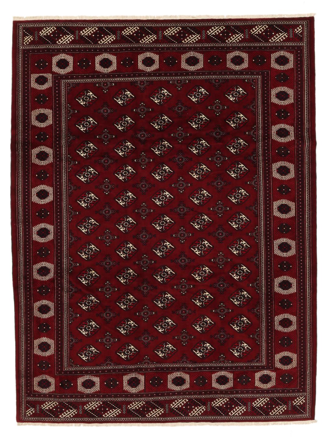 A hand-knotted Turkaman rug from the Middle East in deep red featuring traditional geometric motifs.